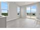 Bright living room with a sliding glass door to the balcony and natural light at 5003 Tiny Ln, Charlotte, NC 28203