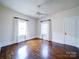 Bedroom with hardwood floors, two windows, and ample light, offering a serene space at 507 6Th W Ave, Gastonia, NC 28052