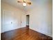 Unfurnished bedroom showcasing hardwood floors and a ceiling fan at 507 6Th W Ave, Gastonia, NC 28052