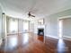 Bright living room featuring hardwood floors, fireplace, and ample natural light at 507 6Th W Ave, Gastonia, NC 28052