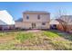 Backyard area of a house featuring a lawn and patio at 5414 Peachwood Dr, Charlotte, NC 28216