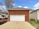 Brick two-car garage, exterior view at 6141 Creft Cir, Indian Trail, NC 28079