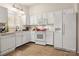 Bright kitchen with white appliances, plenty of counter space, and natural light at 6708 Burning Oak Ln, Charlotte, NC 28216