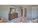 Neutral bedroom featuring carpet and dresser at 8073 Kennesaw Dr, Gastonia, NC 28056