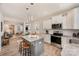 Spacious kitchen featuring a breakfast bar, stainless steel appliances, and a seamless flow into living spaces at 8573 River Ridge Dr, Charlotte, NC 28213