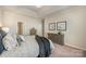 Relaxing main bedroom features tray ceiling, neutral color palette, and ample closet space at 8573 River Ridge Dr, Charlotte, NC 28213