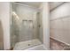 Modern walk-in shower features sleek glass enclosure and tiled walls at 8573 River Ridge Dr, Charlotte, NC 28213