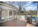 Back deck with a screened in porch and grill, provides a great outdoor space for entertaining, cooking and relaxing at 9200 Four Acre Ct, Charlotte, NC 28210