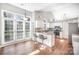 Bright kitchen with granite countertops and a breakfast bar offers a modern and functional space at 9200 Four Acre Ct, Charlotte, NC 28210