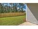 Backyard features a wooden fence and green grass at 9534 Maltese Dr, Gastonia, NC 28056