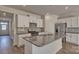 Beautiful kitchen with stainless steel appliances, granite countertops and white cabinetry at 9534 Maltese Dr, Gastonia, NC 28056