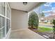 Covered patio provides a transition to the outdoors at 10011 Forest View Ln, Charlotte, NC 28213