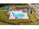 Aerial view of the community pool with lap lanes, a area, and plenty of seating at 1032 Hostler Ln, York, SC 29745