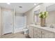 Bathroom with double sink vanity, decorative vase, and a shower-tub combo at 114 Hallmark Estates Dr, Statesville, NC 28625