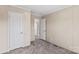 Neutral bedroom features plush carpeting, neutral walls, and interior doors at 114 Hallmark Estates Dr, Statesville, NC 28625