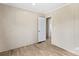 Well-lit bedroom featuring wood-look flooring and interior doors at 114 Hallmark Estates Dr, Statesville, NC 28625