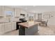 Stylish kitchen featuring light cabinets, black appliances, and a functional kitchen island at 114 Hallmark Estates Dr, Statesville, NC 28625