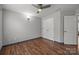 Spacious bedroom featuring closet and wood-look flooring at 11712 Huxley Rd, Charlotte, NC 28277