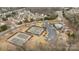 Overhead view of community tennis courts with nearby pool and clubhouse at 11712 Huxley Rd, Charlotte, NC 28277