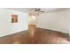 Bright living room with hardwood floors, and an open view into the kitchen at 1323 Queens Rd # 202, Charlotte, NC 28207