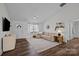 Cozy living room with modern decor, a large window, and neutral color palette at 1707 W 4Th Ave, Gastonia, NC 28052