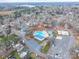 An aerial view of a community featuring a pool and various homes at 171 Holly Harbor Trl # B62, Mount Gilead, NC 27306