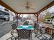 Covered outdoor patio featuring a dining table set with views of the recreational vehicle park at 171 Holly Harbor Trl # B62, Mount Gilead, NC 27306