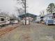 Parking area with metal shelter, RV parking, and additional storage at 171 Holly Harbor Trl # B62, Mount Gilead, NC 27306