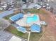 Aerial view of a community pool and covered seating area for residents at 171 Holly Harbor Trl # B62, Mount Gilead, NC 27306