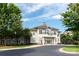 Elegant clubhouse with arched entryway, balconies, and manicured landscaping at 1915 Colony Line Ct, Charlotte, NC 28210