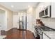 Modern kitchen featuring stainless steel appliances, granite countertops, and ample cabinet space for storage at 1915 Colony Line Ct, Charlotte, NC 28210