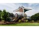 Community playground with shade covering, slides and climbing equipment at 1915 Colony Line Ct, Charlotte, NC 28210