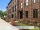 Brick townhomes with fenced courtyards and optional gates available at 214 Gilead Rd, Huntersville, NC 28078