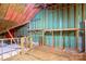 Unfinished attic with wooden beams and turquoise walls at 2227 Cashmere Ct, Denver, NC 28037