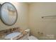 Bathroom featuring a vanity, toilet, and mirror at 2227 Cashmere Ct, Denver, NC 28037
