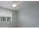 Bedroom featuring neutral walls, carpet floors, natural light, and a ceiling fan at 2227 Cashmere Ct, Denver, NC 28037
