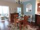 Charming dining area adjacent to the living room with a view of the bedroom at 2227 Cashmere Ct, Denver, NC 28037