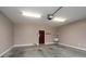An empty garage featuring a sink, lighting, and painted walls at 2227 Cashmere Ct, Denver, NC 28037