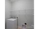 A laundry room featuring a washing machine and wire shelving at 2227 Cashmere Ct, Denver, NC 28037