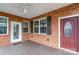 View of the brick covered patio with ceiling fan at 2227 Cashmere Ct, Denver, NC 28037