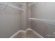 Walk-in closet with shelving and carpeted floor at 2227 Cashmere Ct, Denver, NC 28037