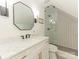 Bathroom featuring a modern sink vanity, glass shower, and minimalist design at 2326 Lathrop Ln, Charlotte, NC 28211