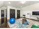 Spacious bonus room with workout space, work space, and natural light at 2326 Lathrop Ln, Charlotte, NC 28211