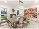 Elegant dining room featuring a modern chandelier, stylish furnishings, and an eye-catching statement wall art at 2326 Lathrop Ln, Charlotte, NC 28211