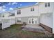 Picture of backyard showing patio, lawn, and the back of the building at 2399 Woodridge Dr, Fort Mill, SC 29715