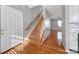 Inviting foyer with hardwood floors and staircase leading to the upper level at 2399 Woodridge Dr, Fort Mill, SC 29715