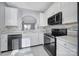 Well-lit kitchen featuring stainless steel appliances and an open design at 2399 Woodridge Dr, Fort Mill, SC 29715