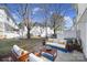 A beautifully staged patio showcasing an outdoor seating area, perfect for relaxing and entertaining, with lush greenery at 2399 Woodridge Dr, Fort Mill, SC 29715