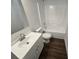 Bright bathroom features a white vanity with a large mirror and a shower-tub combo at 2766 Stagbuck Dr, Gastonia, NC 28052