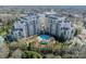 Aerial perspective showcases the building, pool area, and lush landscaping of this luxurious property at 2823 Providence Rd # 236, Charlotte, NC 28211